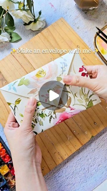 Joly Poa on Instagram: "✨️February✨️ Make this cute envelope with me!😍 Last weekend, my brother got married in Singapore. We all flew in to attend this special occasion. Money envelopes are quite common as wedding gifts in our culture. It's usually in a red envelope but I wanted something different 😂 I saw this envelope video from @maximeee and thought that it'd be great personalized envelope for the couple 😍 Would you try something like this? 😀 #watercolor #watercolorenvelope #watercolorflorals #diywatercolor #watercolorart #botanicalart" Envelope Art Diy, Diy Money Envelopes, Diy Envelopes From Paper, Watercolor Envelope, Make An Envelope, Watercolor Letters, Creative Videos, Brand Aesthetic, Cute Envelopes