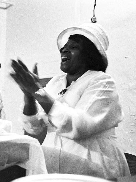 A female pastor leads her flock during a religious service, possibly at the Christ Temple Apostolic Church, a storefront church in Chicago, IL, 1967. (Photo by Robert Abbott Sengstacke/Getty Images) Black Church Aesthetic, Female Pastor, Black Moodboard, Christian Head Covering, Impact Report, Music Corner, Church Aesthetic, Women Church, Black Church