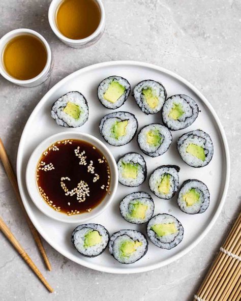 Featuring seasoned short-grain rice and creamy avocado slices, these avocado maki rolls are a crowd pleaser! They are easy to assemble and only call for a handful of ingredients. This avocado sushi is versatile and is great as an appetizer, side dish, or snack. Avocado Maki, Maki Rolls, Avocado Sushi, Avocado Slices, Happy Foods, I Made It, Made It, Side Dishes, Avocado