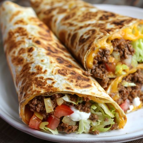 🌮🧀 Crunch into our Chopped Cheese Crunchwraps! 🌮🧀 #Crunchwraps #CheeseLovers Chopped Cheese Crunchwraps Ingredients: Ground beef (1 lb) Onion (1, chopped) Green bell pepper (1, chopped) Cheddar cheese (1 cup, shredded) Large tortillas (4) Tomato (1, diced) Lettuce (1 cup, shredded) Sour cream (1/2 cup) Olive oil (2 tbsp) Salt (1 tsp) Pepper (1/2 tsp) Instructions: In a skillet, heat olive oil over medium heat. Add chopped onion and green bell pepper; sauté until soft. Add ground beef, sal... Tortilla Ideas, Chopped Cheese, Food To Try, Green Bell Pepper, Fine Cooking, Food Babe, Food Therapy, Awesome Food, Yummy Comfort Food