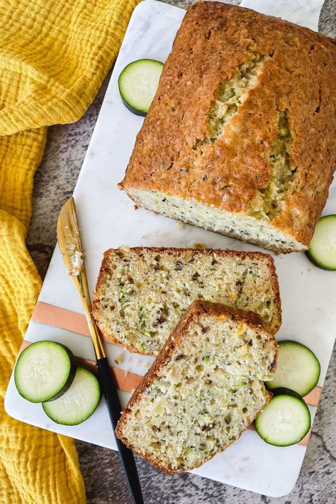 Pineapple and coconut bring the tropical flavors for this zucchini bread. Delectable, moist, and drink with umbrella is optional. Drink With Umbrella, Zucchini Loaf, Mediterranean Breakfast, Rum Extract, Coconut Extract, Pineapple And Coconut, Shredded Zucchini, Zucchini Bread, Summer Squash