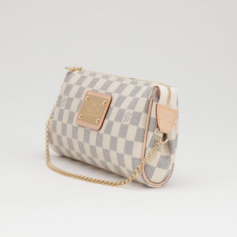 Louis Vuitton Eva Canvas Clutch Bag in Damier AzurThis elegant Louis Vuitton Damier Azur Canvas Eva Clutch Bag is ideal for holding your cosmetics and girly essentials in a fun and elegant manner! The Eva can be converted to a wrist strap with its goldtone strap or carried across the chest with its long, removable leather strap. Whatever you're mood is for the night, this bag is the perfect accessory. Purchase Worn by Princess Charlene on:27 July 2012 Louis Vuitton Eva Clutch Damier Azur, Girly Essentials, Louis Vuitton Eva Clutch, Louis Vuitton Eva, Princess Charlene, Canvas Clutch, Louis Vuitton Damier Azur, Wrist Strap, Louis Vuitton Damier