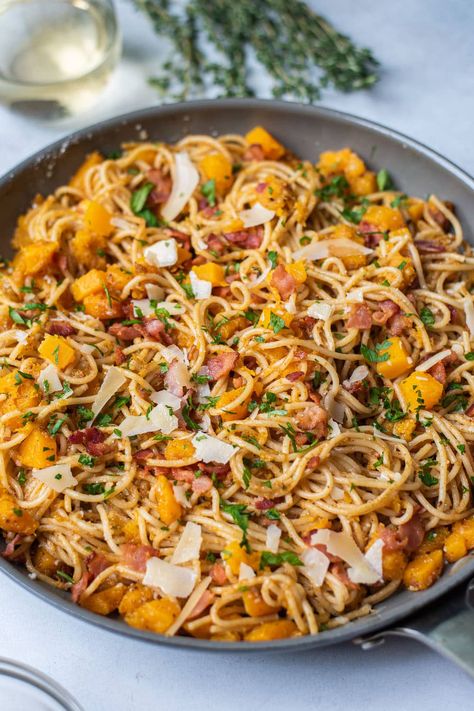 Our butternut squash pasta is a savory dish with a touch of sweetness thanks to a little brown sugar. It's a fall-inspired spaghetti made with tender chunks of butternut squash, crispy bacon, Pecorino cheese, Parmesan cheese, and fresh herbs. Everything is brought together with plenty of butter, cinnamon, nutmeg, and fresh thyme. #butternutsquashpasta #fallrecipes #pasta Pasta Rasta, Creamy Chicken Carbonara, Butternut Squash Recipes Pasta, Squash Pasta Recipe, Chicken Carbonara Recipe, Curry Chicken And Rice, Butternut Squash Pasta, Butter Cinnamon, Squash Pasta