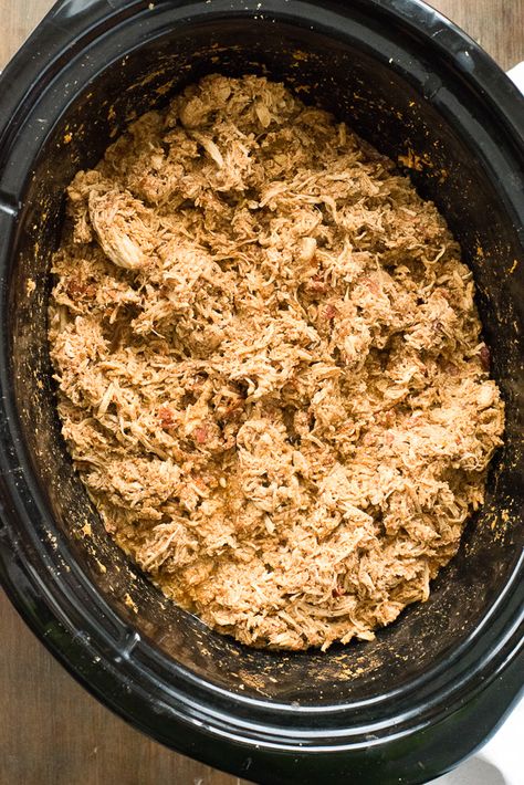 Slow Cooker Mexican Chicken Taco Meat. Savory, spicy chicken with a special trick to shred it effortlessly! Great for Mexican dishes, salads, soups. Makes enough for a crowd or to freeze for leftovers. Gluten-free. - BoulderLocavore.com Shredded Chicken For A Crowd, Taco Salad Bar For A Crowd, Mexican For A Crowd Parties, Crockpot Chicken Tacos For A Crowd, Crockpot Taco Meat For A Crowd, Chicken Tacos For A Crowd, Mexican For A Crowd, Taco Bar For A Crowd, Taco Meat For A Crowd