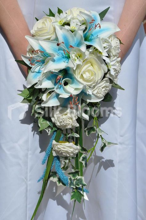 Beautiful Blue Stargazer Lily, Veronica, Ivory Rose and Freesia Cascade Bridal Bouquet Star Gazer Lily Bouquet Wedding, Blue Lillie’s, Blue Stargazer Lily Bouquet, Cascade Wedding Bouquet Blue And White, Calla Lily Bridal Bouquet Blue, Stargazer Lily Bouquet, Cascading Bridal Bouquets, Blue Lily, Lily Bouquet