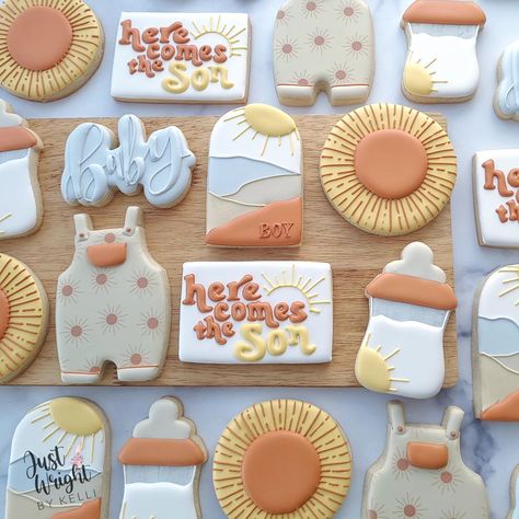 Here Comes The Son! A baby shower set that's bright and joyful, just like the parents-to-be. I wish them so much happiness as they welcome a baby boy into their family. I'll post the cake to match in a little while ☀️ . . . #herecomestheson #suncookies #decoratedsugarcookies #southernNH #localnhbusiness #babyonesie #babyboy #Merrimacknh #merrimackbaker #nashuanewhampshire #Manchesternh #Bedfordnh #hollisnh #bohostyle #bohobaby #boy #sugarcookiesofnstagram #babyshowertheme #herecomesthesun Here Come The Son Baby Shower Ideas, Boy Summer Baby Shower Ideas, Here Comes The Son Baby Shower Cookies, Here Comes The Son Decor, Baby Shower Here Comes The Son, Here Comes The Son Baby Shower Food, Here Comes The Son Baby Shower Cake, Boy Sprinkle Shower Ideas, Here Comes The Son Cookies