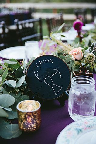 Celestial Retro Ranch Wedding | Nearly Newlywed Blog Wedding Blog Astronomy Table Decor, Celestial Rehearsal Dinner, Celestial Event Decor, Cosmos Wedding Theme, Celestial Wedding Groom, Celestial Table Numbers, Wedding Celestial Theme, Celestial Table Decor, Celestial Centerpiece Wedding