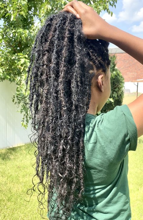 What’s the difference between Goddess Locs and Bohemian Locs? - Natural Hair Stylist Bohemian Crochet Locs, Distressed Locs With Curly Ends, Human Hair Locs With Curly Ends, Natural Boho Locs, Boho Goddess Locs Crochet, Bohemian Locs With Human Hair, Boho Locs With Human Hair, Natural Goddess Locs, Goddess Locks With Curls