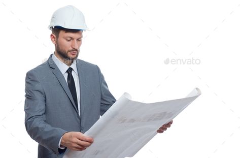 Mature male architect with a blueprint by serhiibobyk. Diligent professional. Handsome mature bearded male architect wearing hardhat looking serious while examining bluepri... #Sponsored #serhiibobyk, #Diligent, #professional, #blueprint Male Architect, Urban Concept, Canva Ebook, Photo Texture, Abstract Photos, Hard Hats, Portfolio, Marketing, Texture