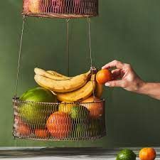 The Best Ways to Store Produce Without Refrigeration | Epicurious Store Produce, Storing Produce, Produce Baskets, Snack Basket, Stacking Bins, Food Tips And Tricks, Produce Storage, Cook Kitchen, Fruit Storage