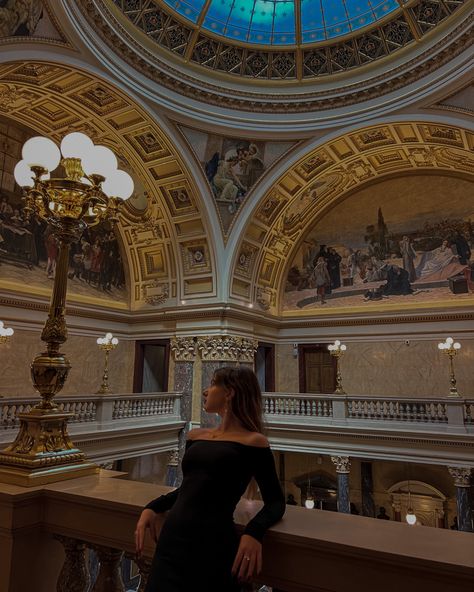 Girl wearing black dress standing in national museum of prague, her head is turned in other direction, she wears cherry red lipstick, she has long red nails, she’s wearing gold accessories Girls Photoshoots, Prague Museum, Vivian Lau, Paris Trip Outfits, Prague Photography, King Of Wrath, Paris Instagram Pictures, Paris Photo Ideas, Prague Photos