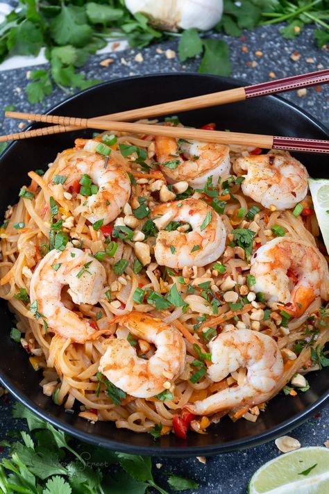 Spicy Shrimp Pad Thai Recipe with Peanut Butter Sauce | ©GarrisonStreetEats | Spicy | Shrimp | Pad Thai | Recipe | Peanut Butter Sauce | Homemade | Easy | Seafood | Homemade Sauce | Pad Thai Noodles | Rice Noodle Recipes | Thai Food recipes | Asian | Entrees | Weeknight Dinner | Dinner Recipes | Pad Thai Sauce | Shrimp Pad Thai | Best | Peanut Sauce | Noodle | Sauce | Peanut Butter | Easy Dinner Ideas | Healthy | Spicy Peanut Noodles | Sriracha | Spicy Thai Noodles | Spicy Peanut Butter Noodles