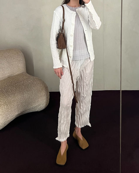 The white cauliflower cardigan and whip pleat pants by ME Issey Miyake styled with Pleats Please light grey soft pleat top, Uma Wang mustard stone ballet flats and MM6 Maison Margiela rustic brown leather numeric bag.⁠ White Cauliflower, Pleat Pants, Bao Bao Issey Miyake, Christian Wijnants, Bao Bao, Pleats Please, Pleat Top, Unisex Dress, Rustic Brown