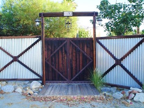 Fence Frame Ideas, Cowboy Bunkhouse, Cheap Backyard Fence Ideas, Corrugated Metal Fence, Metal Fences, Metal Fence Panels, Wooden Gate, Metal Gate, Rustic Fence