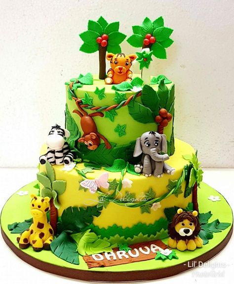 Jungle cake for Dhruva's 1st. How cute are these animals? Cake Flavor : A Belgian Chocolate cake ( callebaut) covered in home made fondant Www.facebook.com/lildelight Home Made Fondant, Animal Cakes For Kids, Belgian Chocolate Cake, Zoo Birthday Cake, Zoo Animal Cakes, Jungle Safari Cake, Jungle Birthday Cakes, Zoo Cake, Jungle Theme Cakes