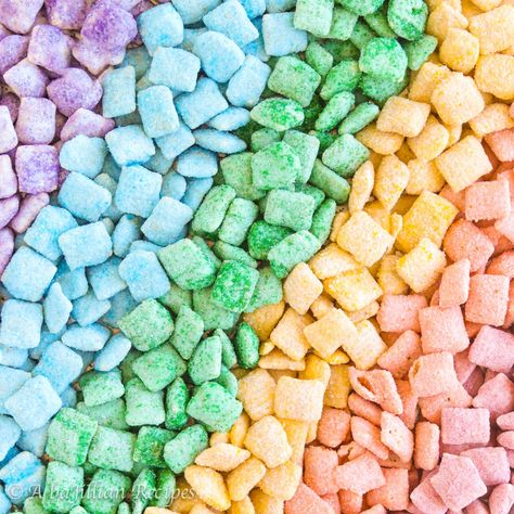 This colorful Puppy Chow is wrapped in rich white chocolate, coated in every color of the rainbow, and flavored with strawberry, orange, lemon, lime, blue raspberry, and grape! Puppy Chow Mix, Jello Flavors, Cereal Snacks, Chex Mix Recipes, Rainbow Food, Puppy Chow, Food Dye, Chex Mix, Red Food Coloring