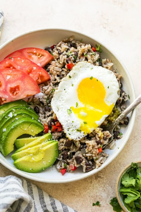 Gallo Pinto is a Central American breakfast typically served with fried eggs, sour cream, and plantains. It’s made with leftover rice and black beans, so it's quick to prepare. #breakfast #rice #beans #highfiber #latinrecipes #costarica Latin Breakfast, Rice And Black Beans, Prepare Breakfast, Breakfast Rice, Gallo Pinto, Vegan Paleo Recipes, Rice Beans, Rice And Beans, American Breakfast