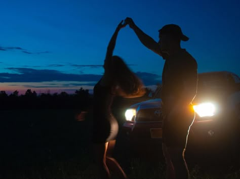 Couple Dancing In Headlights, Truck Couple Aesthetic, Country Couple Dancing In Headlights, Country Life Aesthetic Couple, Dancing In Front Of Headlights Couple, Dancing In Headlights Country, Dating A Cowboy Aesthetic, Small Town Couple Aesthetic, Dancing In The Headlights Country