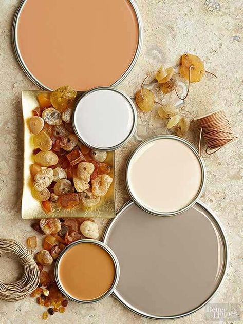 Terra-cotta, putty, khaki, taupe, and amber colors evoke images of rocky landscapes, prehistoric finds, and sandy deserts. Ranging from light to dark, the tones nicely play off one another to quietly add dimension to rooms meant for relaxing. Neutral Paint Palettes Neutral Paint Palette, Yellow Paint Colors, Interior Paint Colors Schemes, Paint Color Schemes, Yellow Paint, Purple Decor, Grey Color Scheme, Nature Color Palette, Decorating Themes