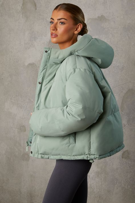 Puffer jacket Completely reversible (solid colour or Bo+Tee printed logo) Oversized design Dropped shoulders Non-detachable hood Elasticated cuff Functional reversible zipper closure with metal snap button covering Side pockets with metal snap buttons Horizontal quilting throughout Adjustable drawstring hem 100% recycled polyester Standard jacket length Product code: BT0789 We do our best to ensure that our photos are as true to colour as possible. However, due to inconsistencies in monitors, digital photography and production variations, we cannot guarantee that the colour you see on your screen accurately portrays the true colour of the product. Winter Hooded Jacket, Cute Puffer Jacket, Best Puffer Jacket, Bo Tee, Puffer Jacket With Hood, Oversized Puffer Jacket, Black Backless Dress, Winter Puffer Jackets, Winter Fashion Outfits Casual