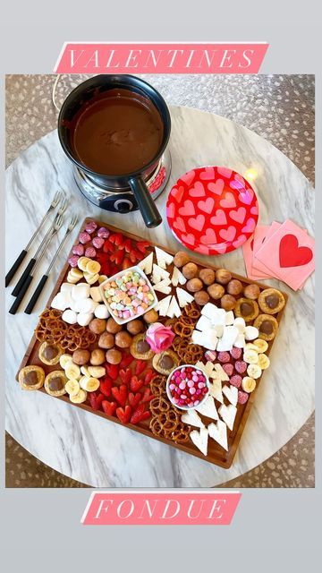 Macy Blackwell on Instagram: "Valentine’s Fondue!🍓 A fun and delicious activity to do with your family, or special someone! 💕 Here’s what we used: - strawberries - angel food cake - bananas - pretzels - peanut butter cookies - donut holes - marshmallows #valentinesdaytreats #valentinesdayfood #vday #valentinesdayideas #valentinesdayfamily #familyfun #familyactivities #fondue #chocolatefondue" Fondue Charcuterie Board, Fondue Board, Strawberry Angel Food Cake, Macy Blackwell, Valentines Snacks, Fondue Pot, Valentines Day Chocolates, Galentines Party, Donut Holes