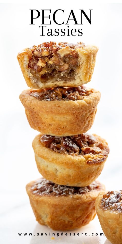 Pecan Tassies are like a mini pecan pie (but not as sweet) made with a cream cheese tart shell. They're buttery, lightly sweet, nutty and oh-so easy to pop right in your mouth! These mini pies are really great for gifting during the holidays. They freeze well and travel great. All you need is a mini-muffin tin and a mixer. #pecantassies #pecanpies #minipecanpies #pecandessert #holidaycookie #pecantassierecipe Pecans Mini Pies, Giftable Baked Goods, Gluten Free Mini Pecan Pies, Mini Pecan Phyllo Tarts, Pecan Pie In Muffin Tin, Pecan Pies In A Muffin Tin, Nut Cups Recipe Pecans, Walnut Tarts Mini, Pecan Pie Tassies Recipe