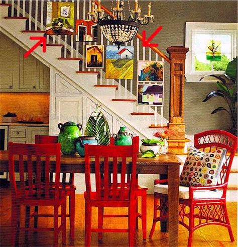 art on stairs Dining Room With Staircase, Red Dining Chairs, Colored Furniture, Red Chairs, Bright Furniture, Eclectic Dining Room, Eclectic Dining, Red Furniture, Stylish Dining Room