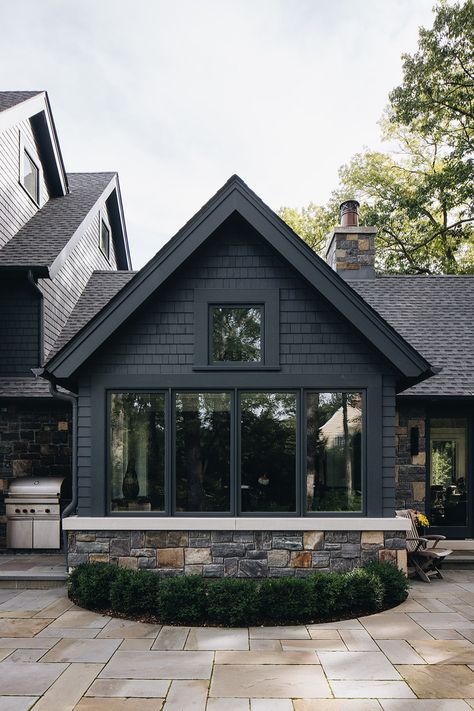 Modern craftsman brings together stone texture with monochromatic siding and loads of windows. 
#modernhome #moderncraftsman Craftsman Sunroom, Modern Home Design Exterior, Mountain Craftsman, Home Design Exterior, Modern Craftsman, Modern Home Design, Modern Mountain, Stone Texture, Design Exterior