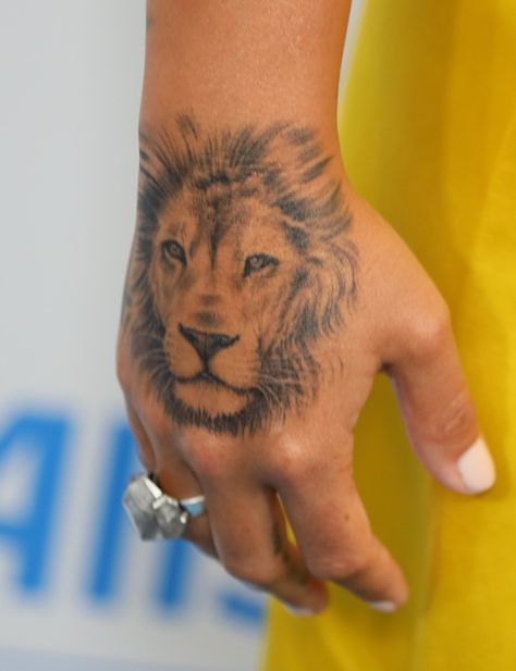 The Ultimate Celebrity Tattoo Gallery Demi Lovato Tattoos, Tattoos In The Workplace, Female Lion Tattoo, Lion Tattoo Meaning, Lion Hand Tattoo, Ariana Grande Tattoo, Horoscope Tattoos, Body Image Art, Hand Tattoos For Women