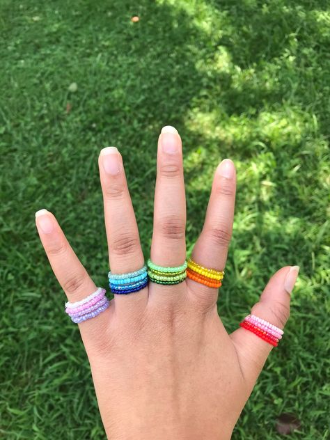 Cute handmade seed rings. Comes in a set of 4. Seed Bead Rings, Rings Colorful, Bead Rings, Diy Beaded Rings, Manik Manik, Diy Ring, Snapchat Quotes, Bracelets Design, Bead Charms Diy