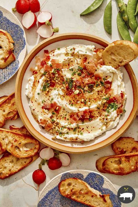 Whipped goat cheese topped with hot honey, seasonings, and bacon spooned onto crostini is a simple and delicious 10-minute appetizer! #appetizer #cheese #goatcheese #easyappetizer Honey Appetizers, Potato Dip, Baked Potato Dip, Goat Cheese Dip, Roasted Tomato Salsa, Spoon Fork Bacon, Whipped Goat Cheese, Goat Cheese Recipes, Football Party Food