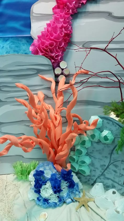 Pool noodle coral and coffee filter barnacles dyed with cloth dye Making Coral Reef Out Of Pool Noodles, Coral Reef Pool Noodles, Coral Made Out Of Pool Noodles, Cardboard Coral Reef Diy, Coral Reef Stage Prop, Ocean Vbs, Decor Marin, Under The Sea Decorations, Underwater Theme