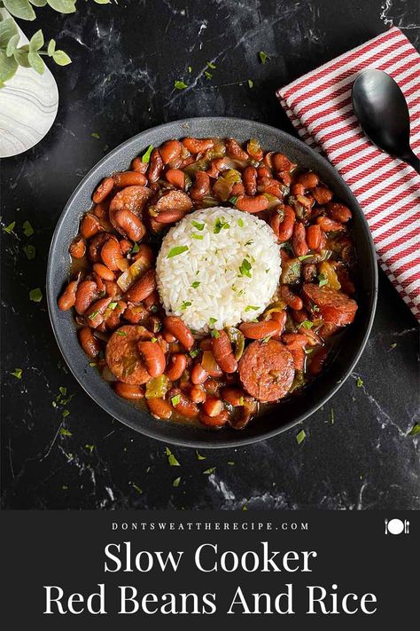 Our Slow Cooker Red Beans and Rice recipe is SOOO GOOD! You will never consider red beans and rice from a box. #crockpot #slowcooker #redbeans #cajun Crockpot Red Beans And Rice With Sausage, Slow Cooker Red Beans And Rice, Slow Cooker Bean Recipes, Red Beans And Rice Crockpot, Mexican Crockpot Recipes, Crockpot Red Beans, Cajun Red Beans And Rice Recipe, Red Beans And Rice Recipe Crockpot, Slow Cooker Red Beans