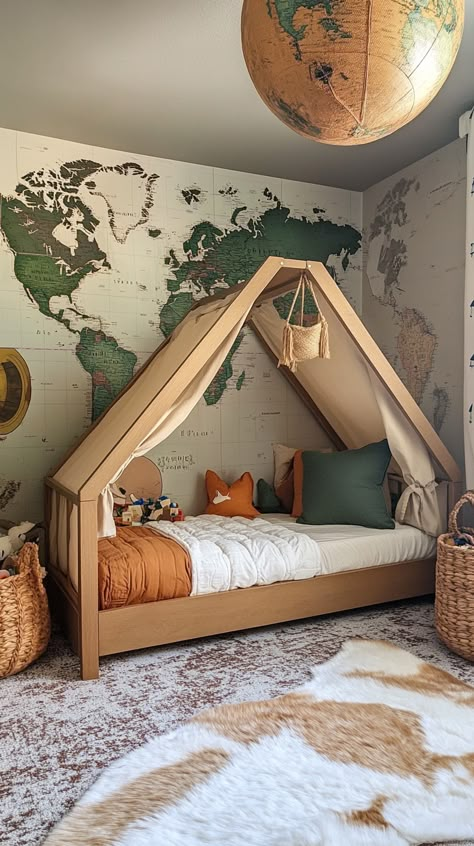 Ignite your child's wanderlust with a Sagittarius adventure-themed room 🌍✨! Featuring a captivating world map mural 🗺️, a cozy tent bed ⛺, globe light fixtures 🌐, and travel-inspired toy storage 🧳. Perfect for little explorers ready to dream big and discover the world! 🚀 Cozy Toddler Bed, Kids Adventure Bedroom, Adventure Room Ideas, Arlo Bed, Boys Adventure Bedroom Ideas, Boys Outdoor Theme Bedroom, Adventure Bedroom Ideas, Outdoor Theme Bedroom, National Park Room