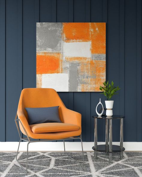 Navy And Orange Office, Orange Office Ideas, Office With Orange Accents, Accent Wall With Artwork, Orange And Blue Walls, Orange Blue Interior, Blue And Orange Office Design, Orange And Blue Office, Blue And Orange Wall Paint Ideas