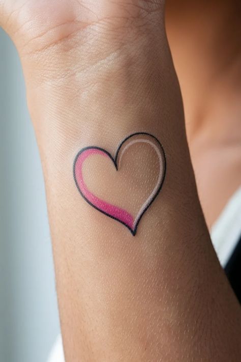 A heart tattoo on a wrist with a gradient of pink and black. Heart Wrist Tattoos, Small Heart Wrist Tattoo, Line Heart Tattoo, Heart Wrist Tattoo, A Heart Tattoo, Tattoo Ideas For Females, Creative Tattoo Ideas, Heart Tattoo Wrist, Patterns Watercolor