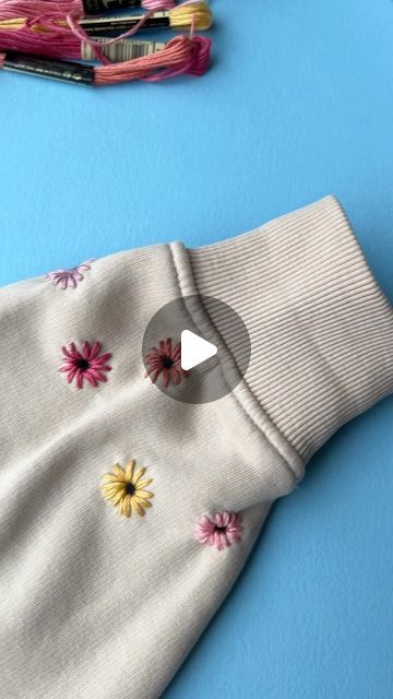 Jenny ~ Embroidery Art, Design & Crafts on Instagram: "A really simple cuff for spring 🌸
.
.
#upcycledclothing 
#upcycledfashion 
#embroideredflowers 
#embroideredclothing 
#embroidereddenim 
#embroideredclothes 
#embroideredflorals 
#learntoembroider 
#mindfulart 
#slowstitching 
#sewingproject 
#embroiderypatterns 
#bordadolivre 
#createdtocreate 
#diycrafts 
#slowcraft 
#dmcthreads 
#dmcembroidery 
#springflowers 
#embroiderydesign 
#beginnerembroidery 
#embroiderywork 
#denimembroidery 
#sustainablefashion 
#embroiderhappyhoops 
#embroiderytutorial 
#embroideryprocess 
#embroideryproject 
#handsew" Embroidery Sweatshirt Diy, Hand Embroidery On Clothes, Embroidery Inspiration Clothing, Cuff Embroidery, Learning To Embroider, Denim Embroidery, Simple Embroidery Designs, Diy Sweatshirt, Embroidery On Clothes