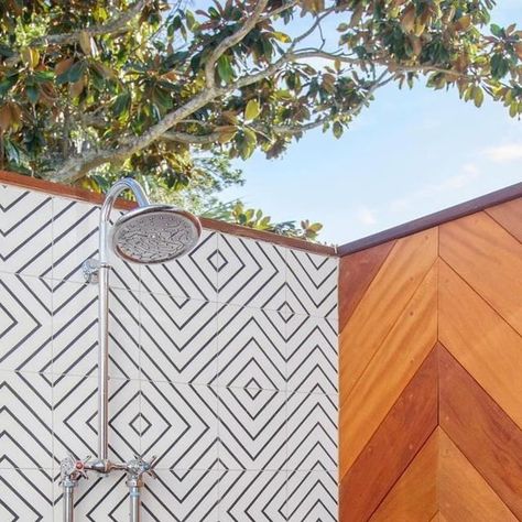 Riad Tile on Instagram: "The warmer weather has us craving a day by the pool! Riad Tile’s Maya White cement tile provides a playful splash of pattern to this already spectacular outdoor shower.  Design: @corinhavensinteriors Photo: @margaret.wright" Outdoor Shower Design, Riad Tile, White Cement, Cement Tile, Shower Design, Outdoor Shower, Florida Home, The Pool, Cement