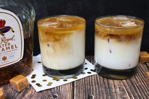 two glasses of crown royal salted caramel white russian drinks against a dark background Vanilla Crown Drinks, Carmel Crown Royal Recipe, Salted Caramel Crown Drinks, Salted Caramel Crown Royal Drinks, Salted Caramel Crown Royal, Russian Drinks, Crown Royal Salted Caramel, Salted Caramel Drinks, Salted Caramel White Russian