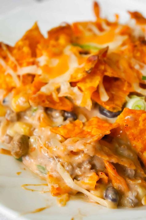 Doritos Casserole with Ground Beef is an easy dinner recipe the whole family will love. This hearty casserole is loaded with ground beef, cream cheese, corn, black beans, shredded cheese and topped with crumbled Doritos. Doritos Casserole With Ground Beef, Doritos Recipes, Hamburger Casseroles, Easy Ground Beef Dinner, Doritos Casserole, Easy Ground Beef Casseroles, Casserole With Ground Beef, Casseroles Recipes, Meatloaf Casserole