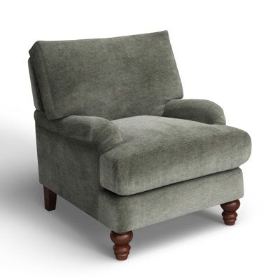 What better way to welcome traditional farmhouse charm into your living room than with a cozy armchair? This one features recessed arms and turned, tapered front legs in a warm brown finish. Integrated sinuous springs and a down + foam blend combine for comfort and support. Select from a variety of upholstery fabrics, hues, and patterns to compliment your décor scheme. Drape a throw over the back to make it even more inviting. Birch Lane™ Fabric: Nave Metal Performance Distressed Velvet Birch La