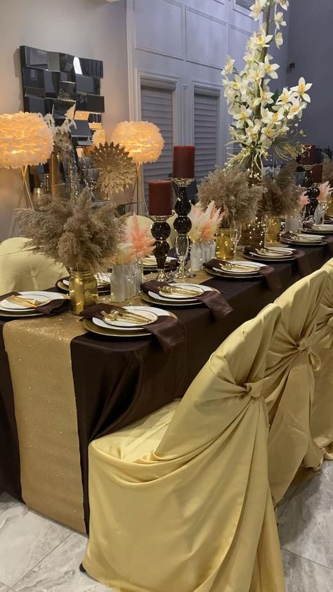 Gold and brown decor party in 2022 | Brown decor, Gold table setting, Table centerpieces Formal Dining Room Table Decor, Gold Table Setting, White And Gold Decor, Setting Table, Gold Graduation Party, Brown Dining Table, Graduation Tables, Brown Decor, Birthday Dinner Party