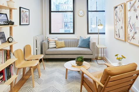 47 Therapist Office Decors We Adore: 2023 Edition Small Psychotherapist Office, Small Counselor Office Ideas, Relaxing Therapy Office, Psychological Counseling Room Design, Masculine Therapy Office, Minimalist Therapy Office, Calm Therapy Office, Cozy Therapy Room, Private Practice Therapy Office Decor