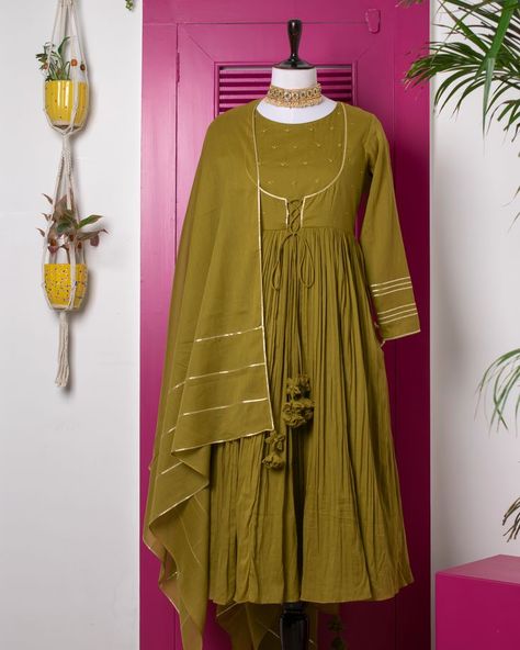 A fine blend of two wonderful fabrics - cotton and mulmul is the game changer of this ethnic attire. The jacket-like design made of cotton fabric embedded on the gathered mulmul body adds modernity to the Anarkali. It has cotton doris with daisy latkans that convey a feminine vibe. #onlineshopping #jovifashion #anarkali #ethnicwear #aesthetic Gathered Anarkali, Cotton Anarkali Dress, Cotton Anarkali, Beautiful Ocean Pictures, Anarkali Dress Pattern, Ocean Pictures, Anarkali Dress, Beautiful Ocean, Game Changer