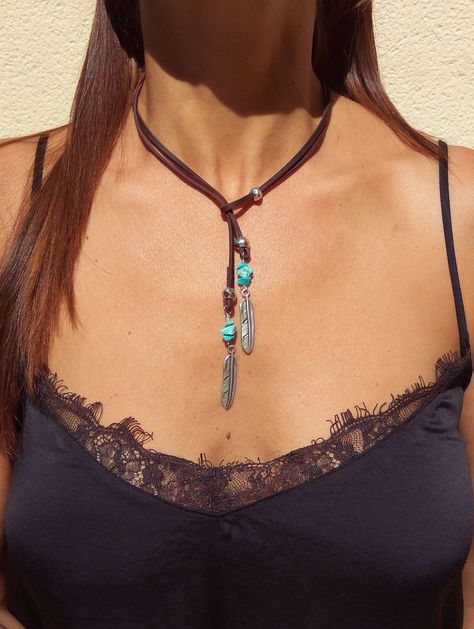 Turquoise gemstone necklace, leather necklace, boho necklace, natural stone necklace, belong to boho jewelry as well as Bohemian Jewelry carefully designed and crafted by EndiaDesign. Show off a bohemian style with this unique lariat necklace for women made of high quality cow leather, turquoise gemstones and silver plated feathers and beads. You could wear t...#with #Exploring #Boho #Free #Bohemian #JewelryDesign #Jewelry #Embrace #Your #Gemstone #Accessories #Spirit #Style #StatementJewelry Boho Leather Necklace, Natural Stone Necklace, Necklace Leather, Wrap Necklaces, Hippie Necklace, Natural Stones Necklace, Gemstone Beaded Necklace, Boho Leather, Handmade Jewelry Designs