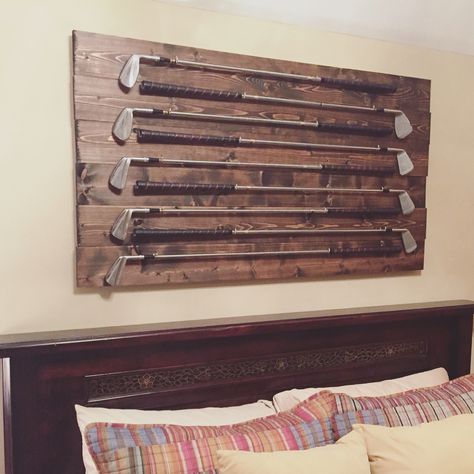 Golf Club Art! A couple of 1x6's (Home Depot cut to length), some cup hooks and a few clubs! And bam...a great piece of wall art! #youcandothis Golf Club Art Diy Wall Decor, How To Display Old Golf Clubs, Golf Course Decorating Ideas, Vintage Golf Club Display, Golf Club Wall Display, Golf House Decor, Golf Man Cave Decor, Golf Club Decor, Diy Golf Decor