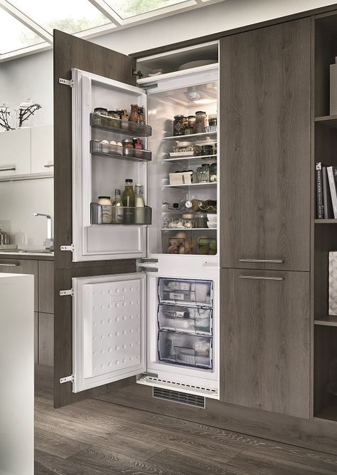 The Lamona integrated fridge freezer looking stylish in the Greenwich Dark Grey Oak Kitchen from the Universal Collection by Howdens Joinery. Visit our website to find out more. Integrated Kitchen Design, Kitchen Integrated Fridge, Modern Kitchen Fridge Cabinet, Inbuilt Refrigerator In Kitchen, Kitchen With Integrated Fridge, Kitchen Design With Fridge, Inbuilt Fridge Kitchen, Kitchen Ideas With Fridge, Fridge In Cupboard