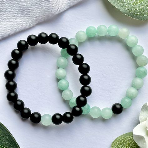 Couple Collection - Amazonite/Black
Handmade black bead and amazonite crystal bead bracelets with one alternate bead on each bracelet.

Perfect gift for your loved ones. Beads Bracelet Design Couple, Friendship Bracelets For 2, Couple Friendship Bracelets Diy, Couple Beads Bracelets, Bsf Matching Bracelets Beads, Couple Beaded Bracelets, Bff Bracelets For 2, Friendship Bead Bracelets, Couple Crystal Bracelet