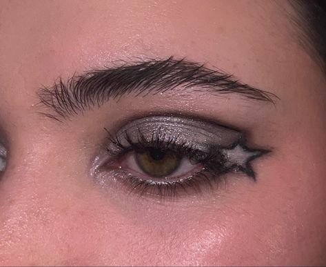 Simple Black And Silver Eyeshadow, Black Eyeliner And Eyeshadow, Black N Silver Makeup, Black Grey Eye Makeup, Black And Silver Star Makeup, Black Concert Makeup, Star Makeup Hooded Eyes, Star Eyeliner Stamp Looks, Grungey Smokey Eye Makeup