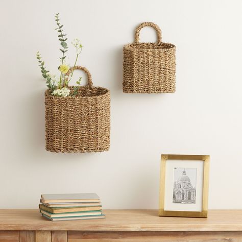 Trista Natural Seagrass Hanging Wall Basket - World Market Baskets On Wall For Storage, Wall Basket Decor Ideas, Baskets Bathroom, Basket Walls, Hanging Wicker Baskets, Hanging Wall Baskets, Wall Plant Holder, Rugs Outdoor, Cottagecore Home